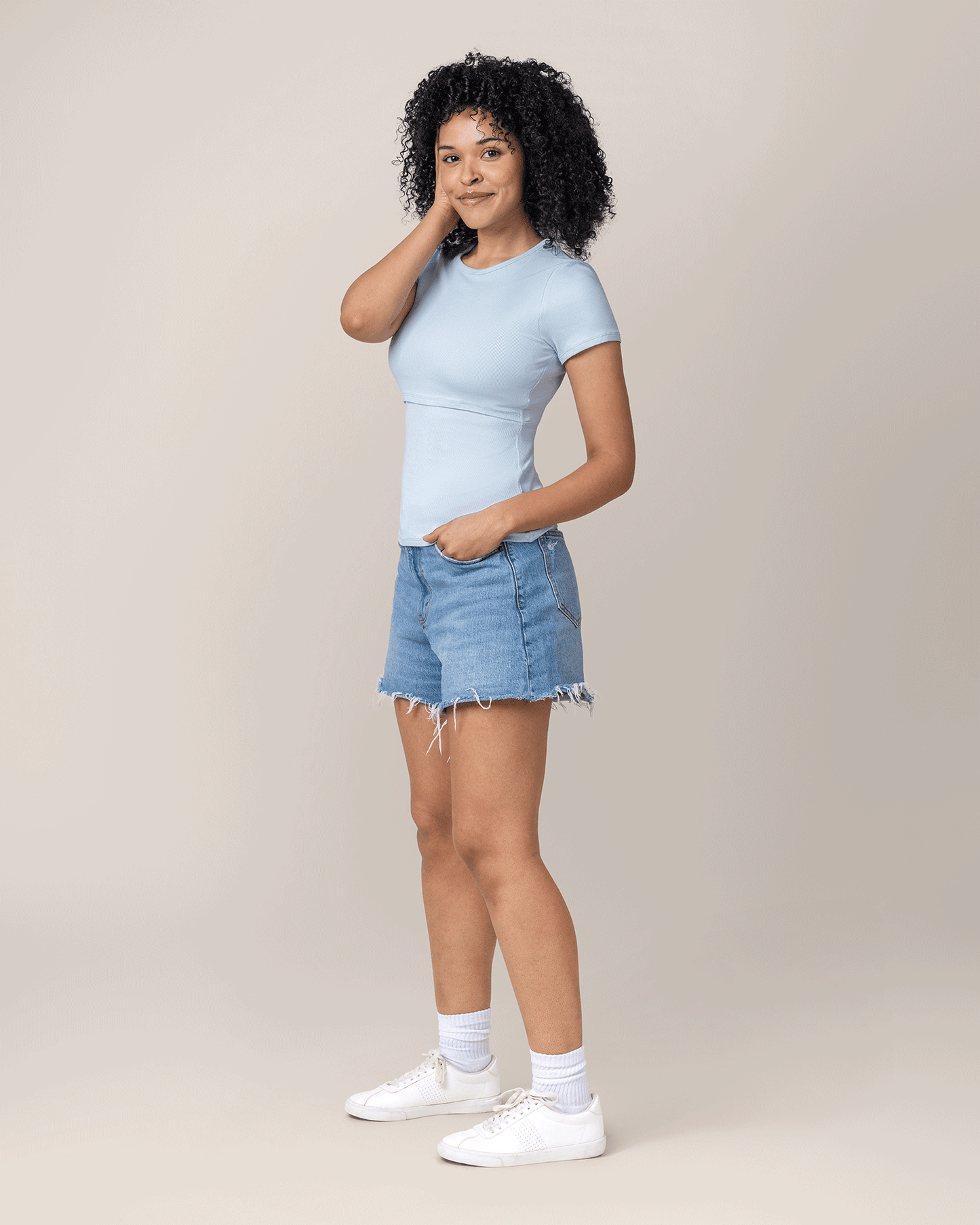 Side view of model wearing Ribbed Bamboo Crew Neck Nursing T-shirt in French Blue